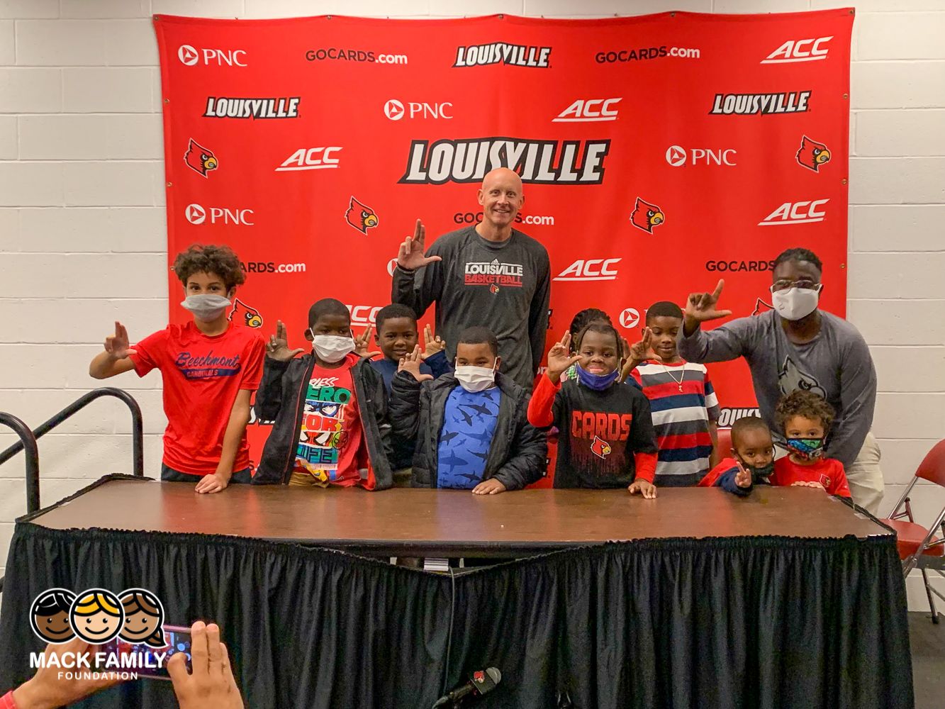 Coach Chis Mack joined by "Game Day" students pre-KSU Exhibition Game